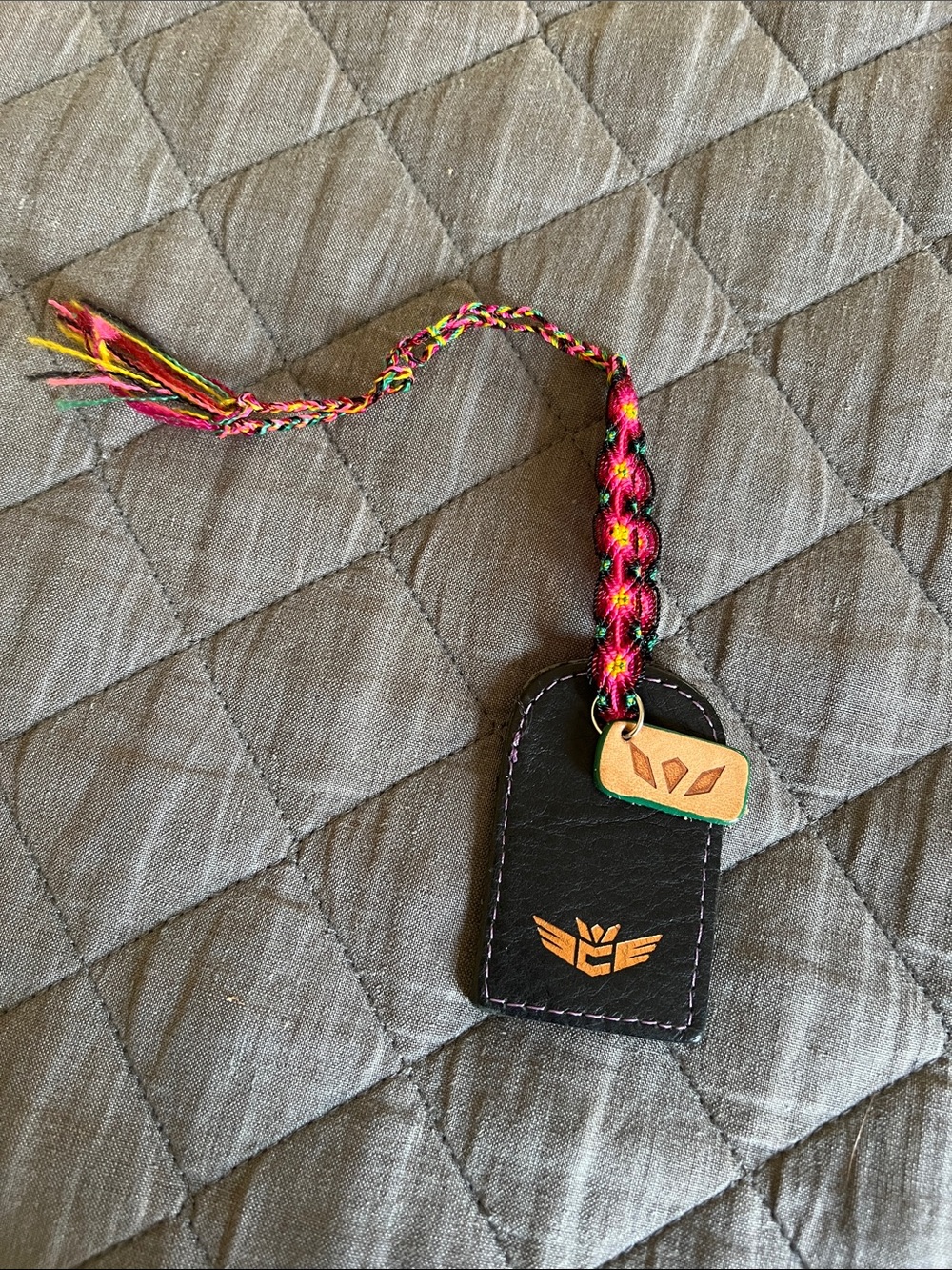 CONSUELA BLACK LEATHER BAG TAG CHARM